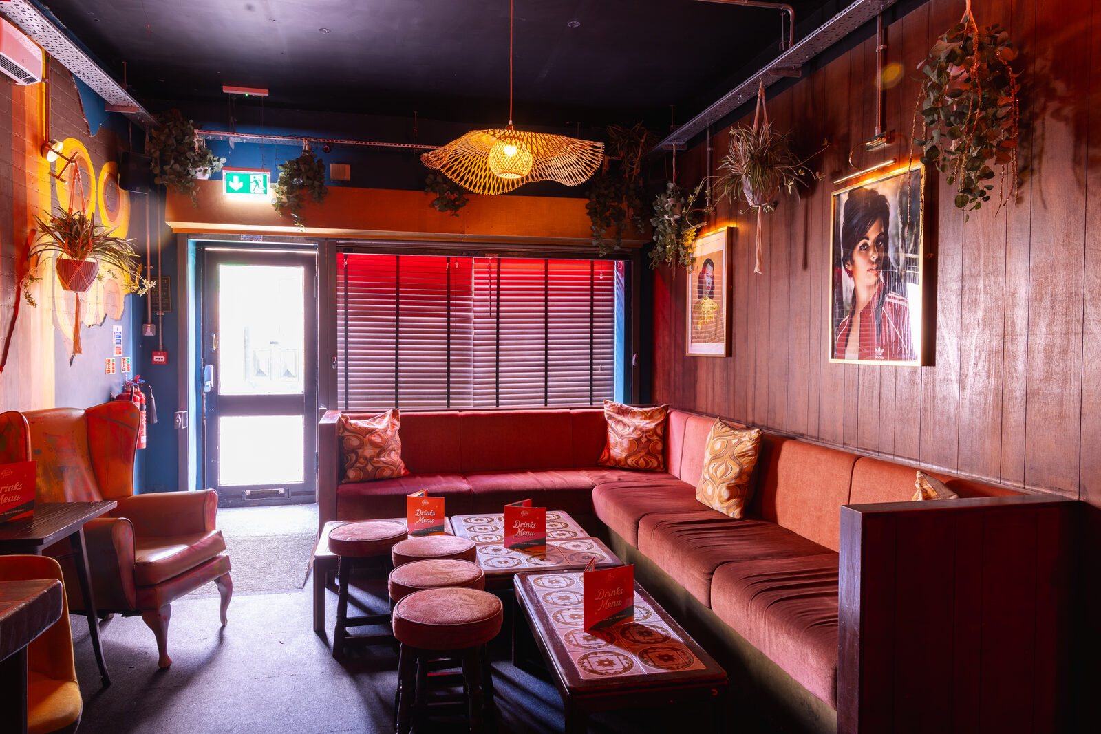 Cherry Jam's red velvet booths set up and ready for a private group